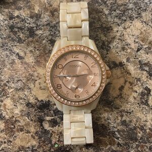 Women's FOSSIL watch.